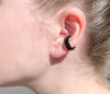 Chunky goth black ear cuff on ear. Hand-painted enamel. 