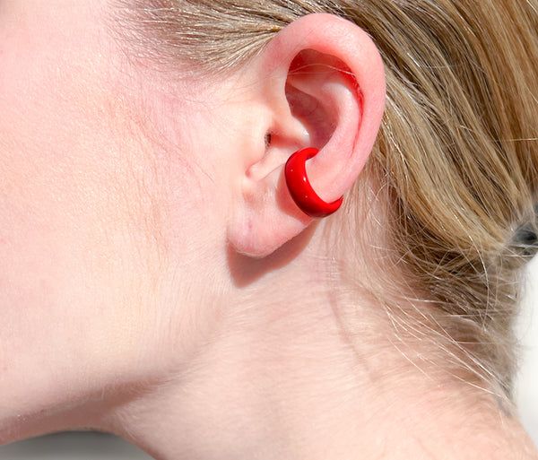 Chunky devils red ear cuff on ear. Hand-painted enamel.